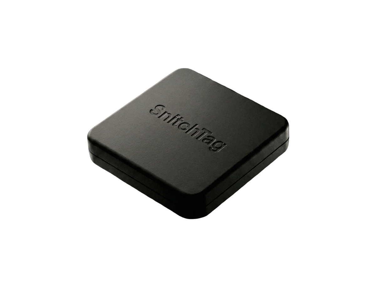 snitchtag — a small matte-black tag