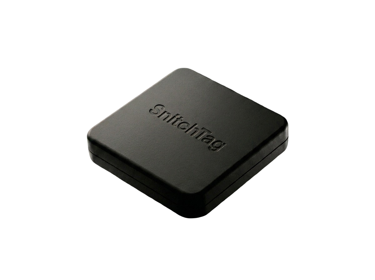 snitchtag — a small matte-black tag